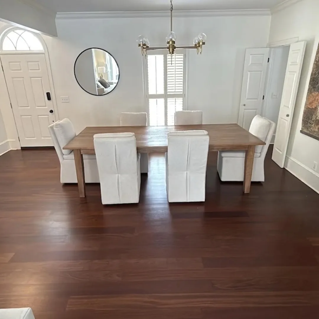 Dark hardwood floor in dining room.