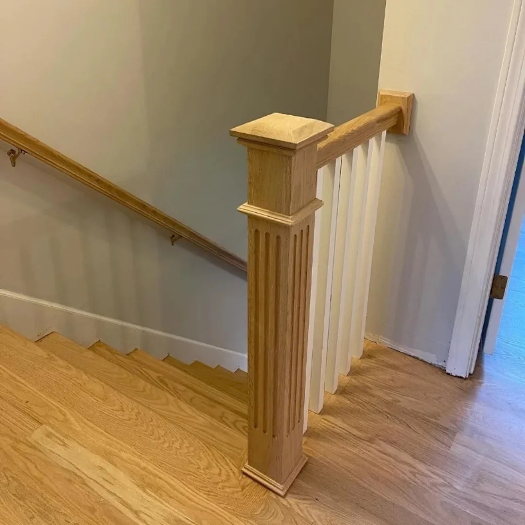 Newly installed hardwood stairs and railing.